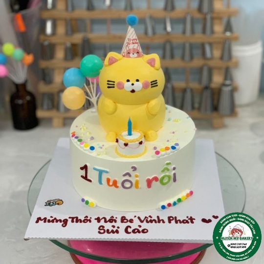 Bánh kem con mèo ngồi thôi nôi